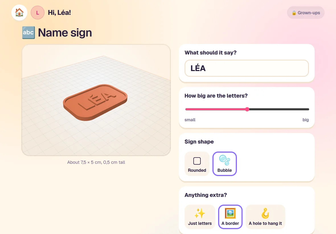 Making a name sign: the word LÉA in raised letters, with big buttons for the shape and a border